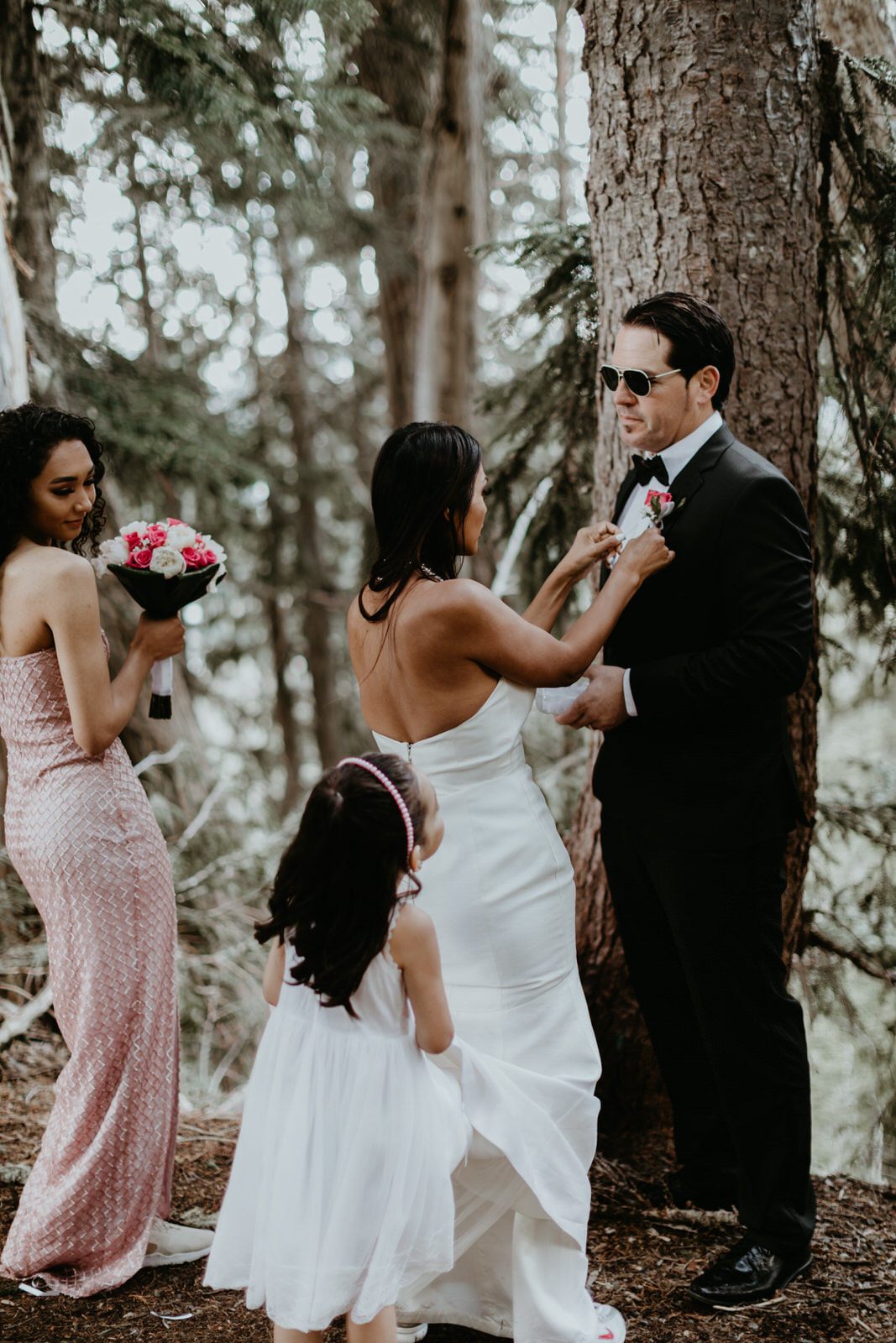 The couple renewing their vows surrounded by family at Mt. Rainier National Park.