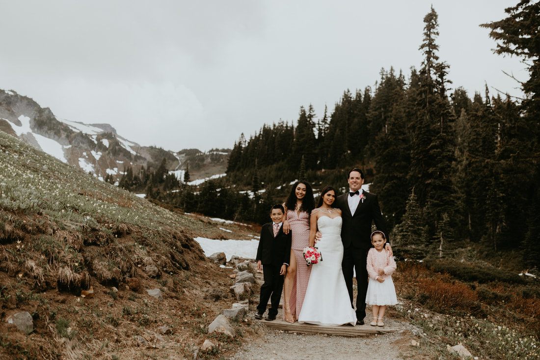 The Navarro family gathered together in the old-growth forest near Mt. Rainier.