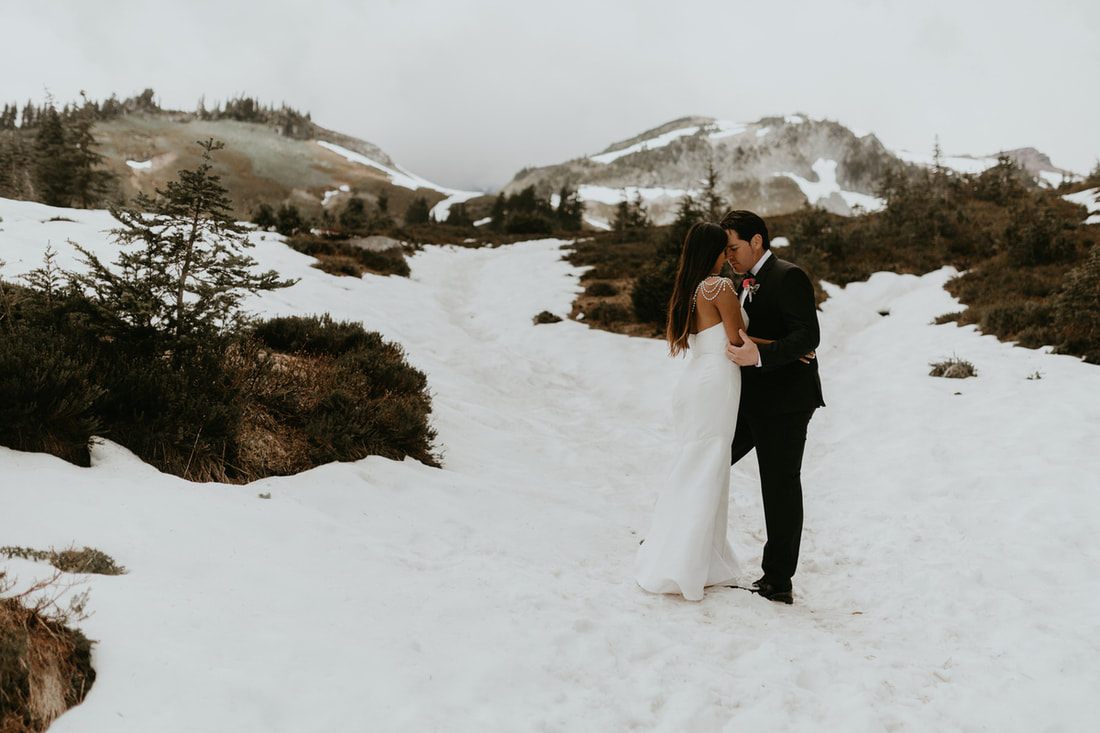 Close-up of the couple embracing during their 10-year anniversary vow renewal.