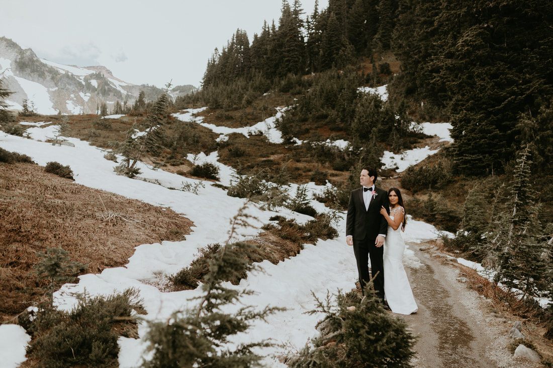 The Navarro family posing together with Mt. Rainier visible in the background.
