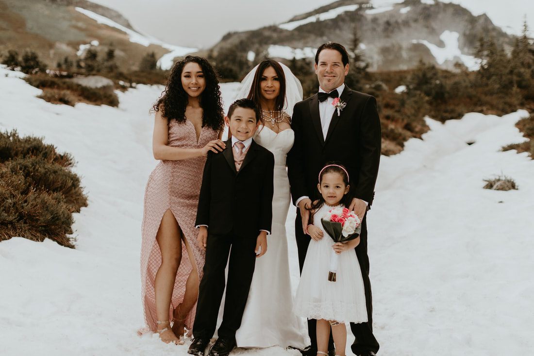 Golden light filtering through the trees during the Navarro family's mountain celebration.