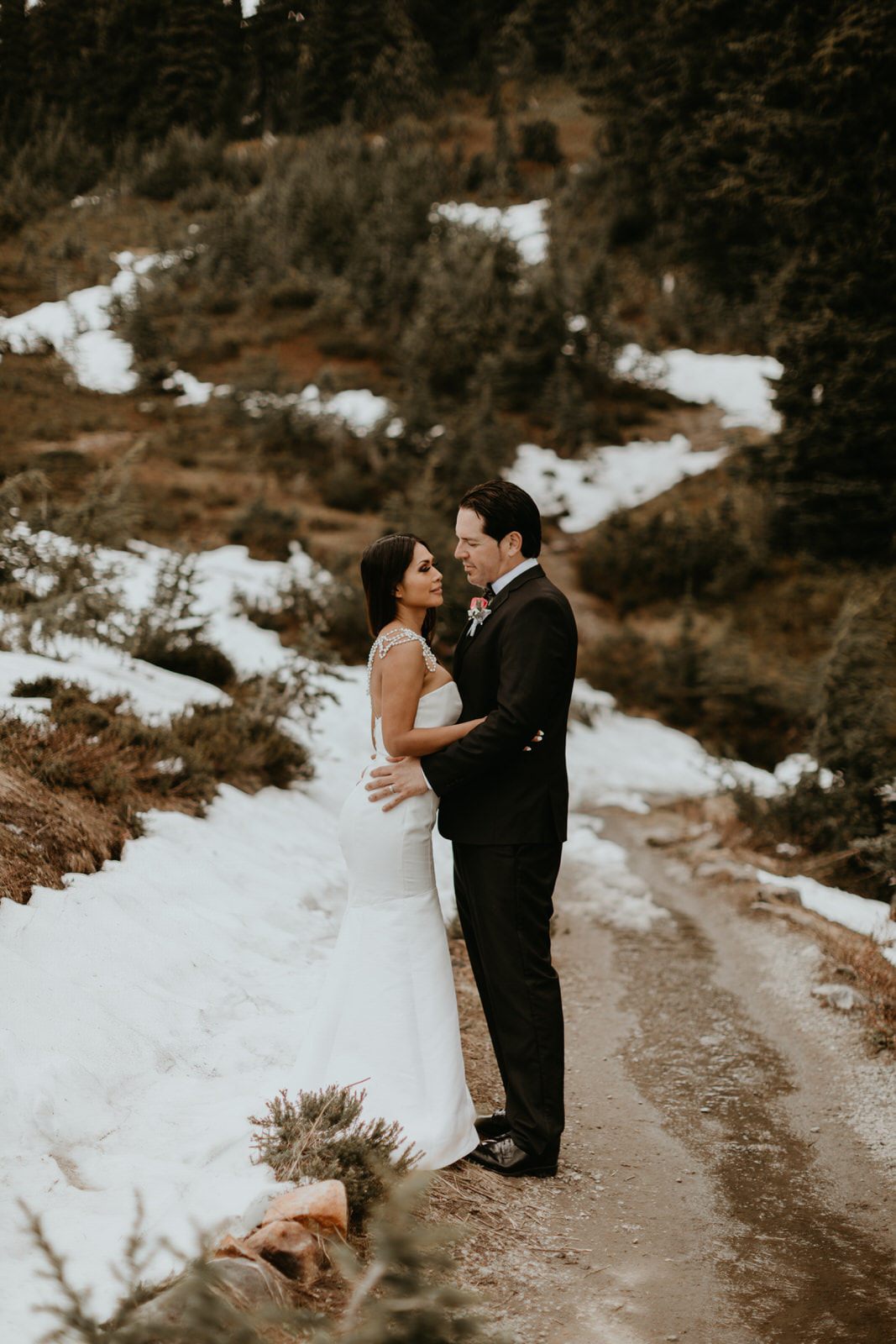 The couple renewing their vows surrounded by family at Mt. Rainier National Park.