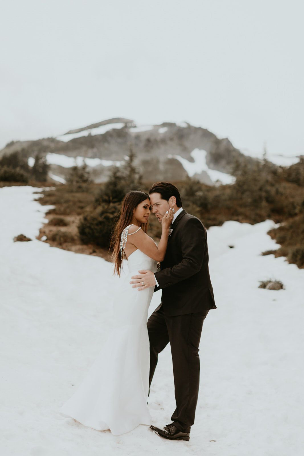 Close-up of the couple embracing during their 10-year anniversary vow renewal.