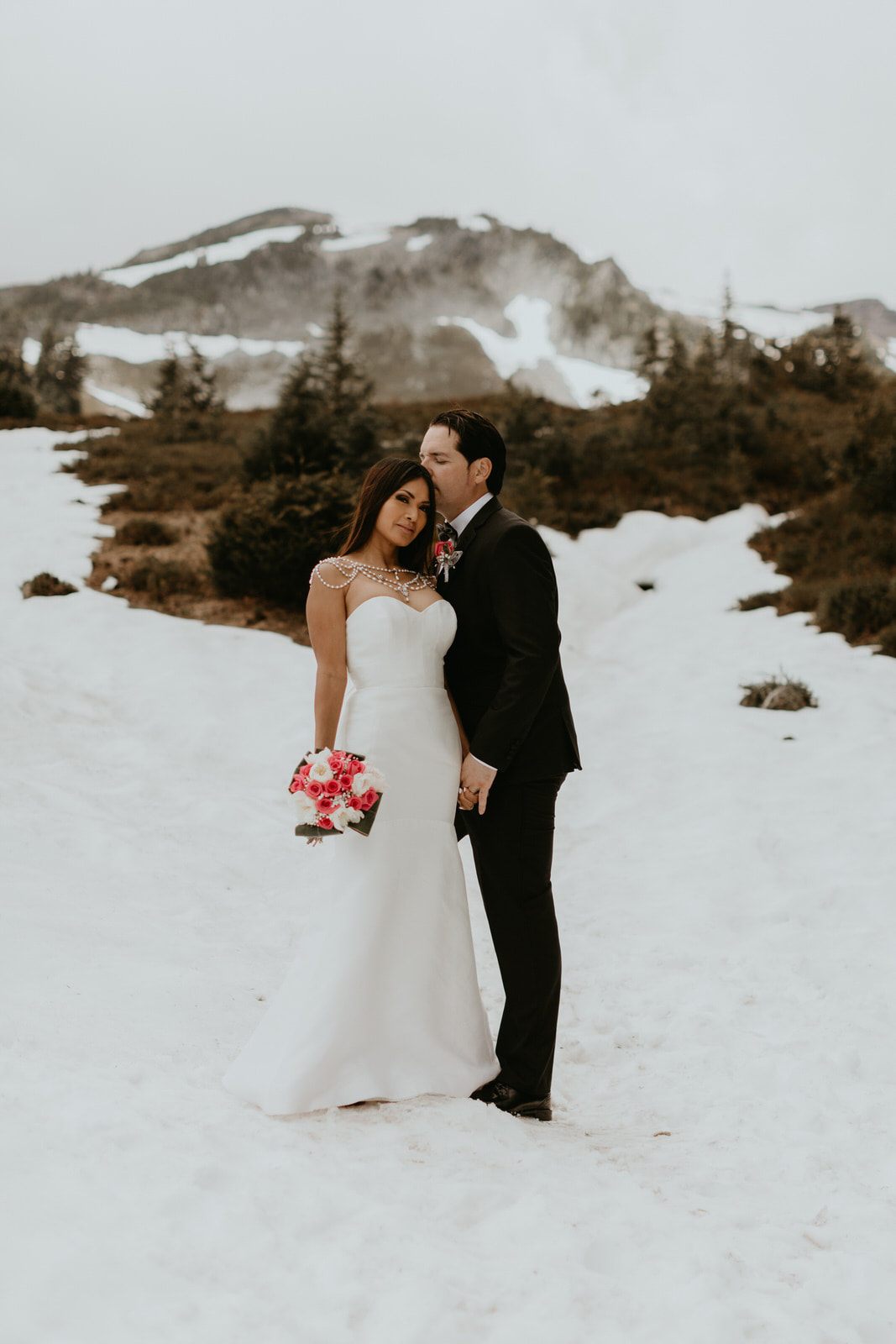 The couple renewing their vows surrounded by family at Mt. Rainier National Park.