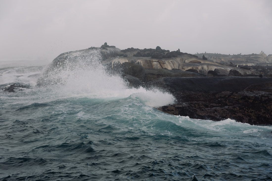 Photo of waves crashing at the southwestern tip of the African continent in Cape Town, South Africa