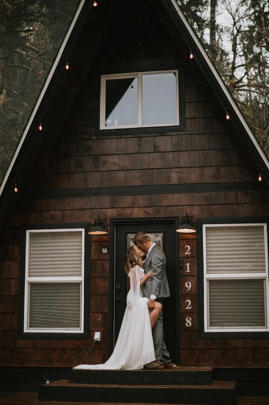 Bride and groom laughing together during a quiet moment outdoors