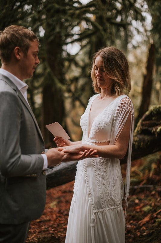 Couple sharing a slow dance outside the a-frame cabin