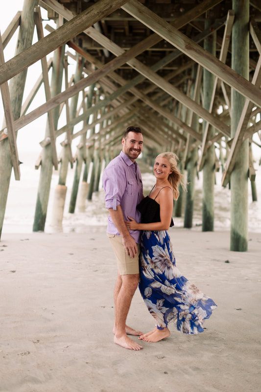 Andrew and Kelly pausing for a quiet portrait under the oaks sprawling branches