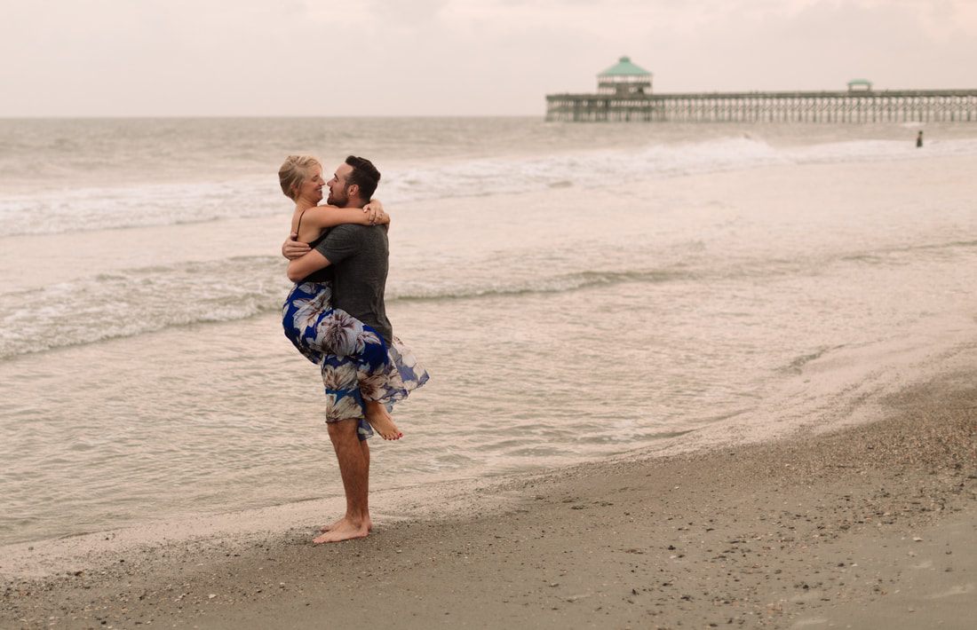 The couple pausing for a quiet portrait on a rural stretch of Johns Island