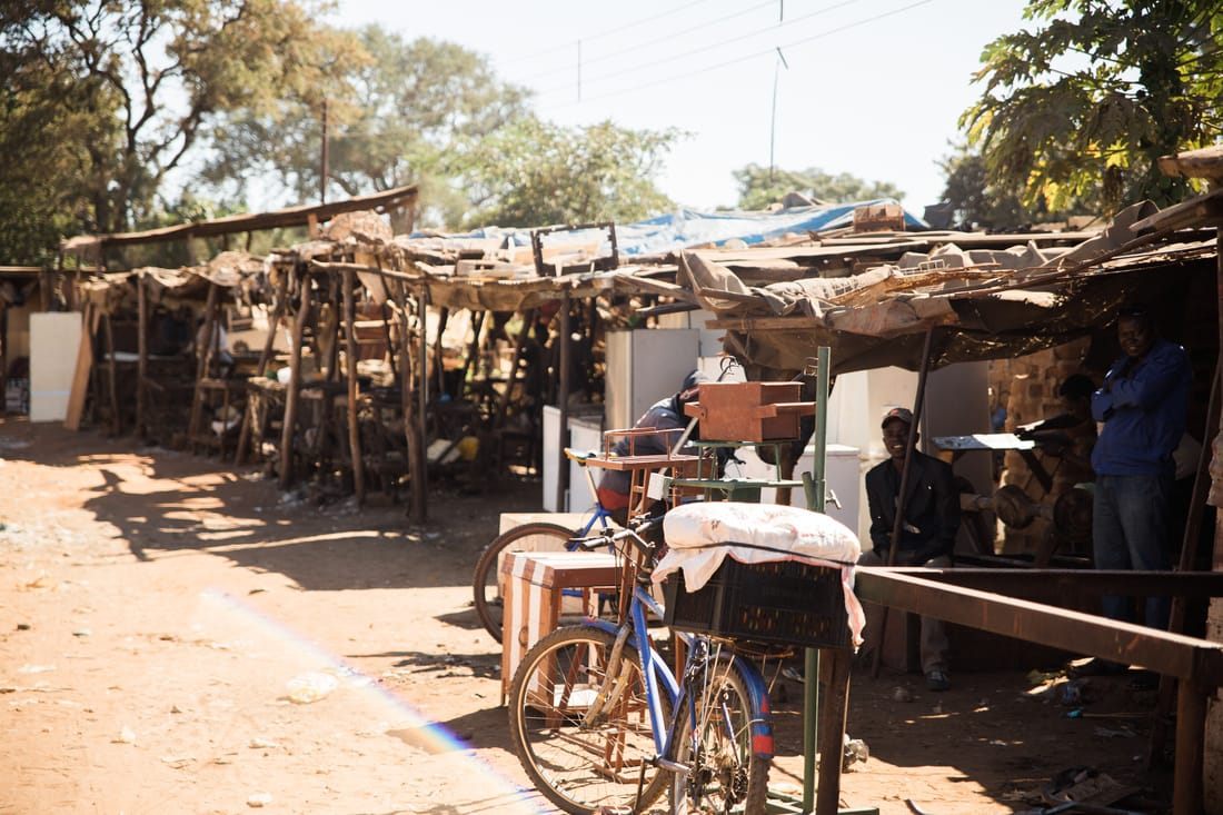 Stalls of fresh produce at a local market in Livingstone, Zambia