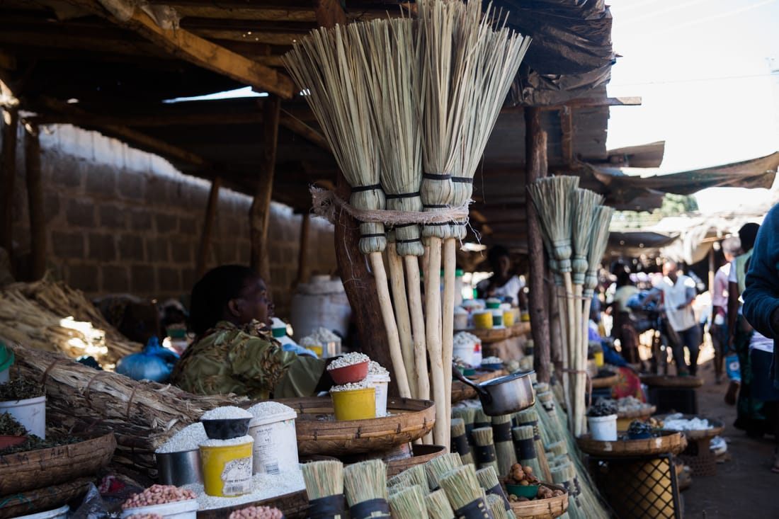 Vendor selling handmade goods at an informal market in Livingstone, Zambia