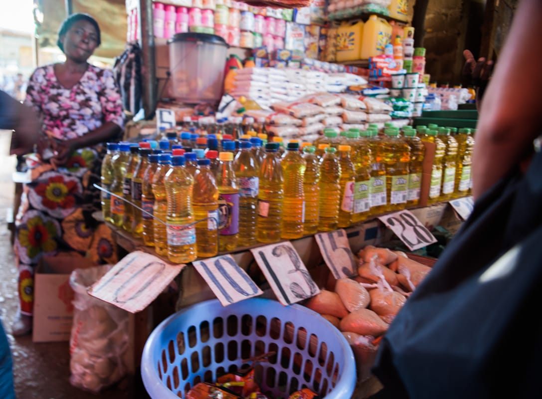 Vendor selling handmade goods at an informal market in Livingstone, Zambia