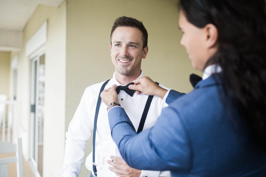 Bride and groom exchanging vows outdoors at Magnolia Plantation