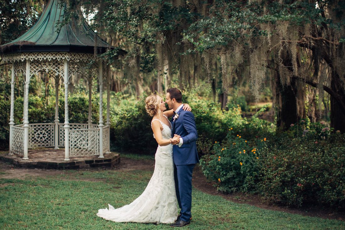 Wedding party portrait among the Spanish moss at Magnolia Plantation