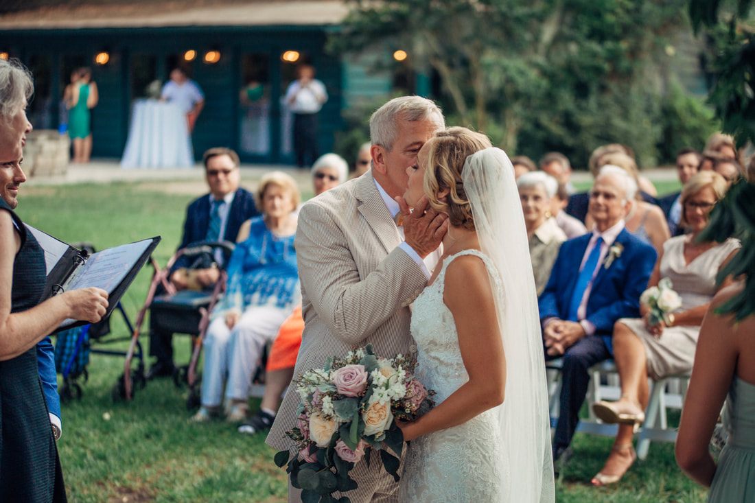 First kiss between Ashley and Madison at their Magnolia Plantation wedding