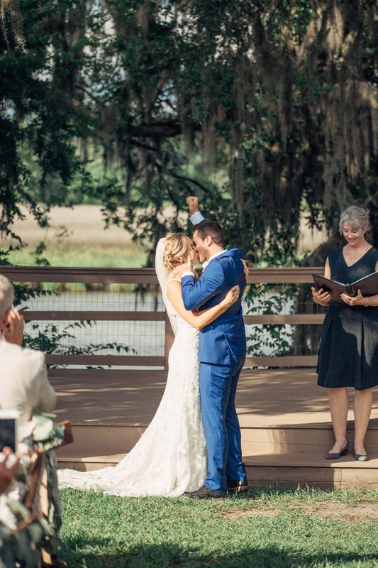 Bride and groom sharing a quiet moment during golden hour at Magnolia Plantation