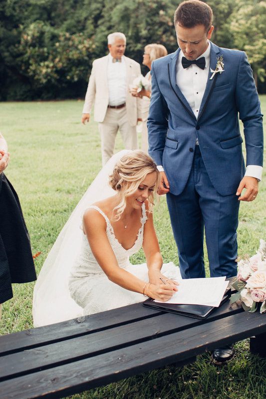Bride and groom portrait beneath the historic oaks at Magnolia Plantation