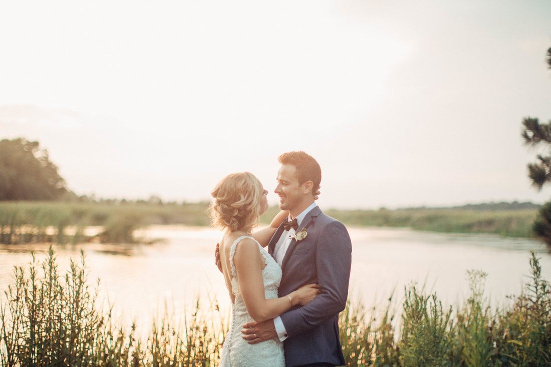 Bride laughing during her getting-ready portraits at Magnolia Plantation