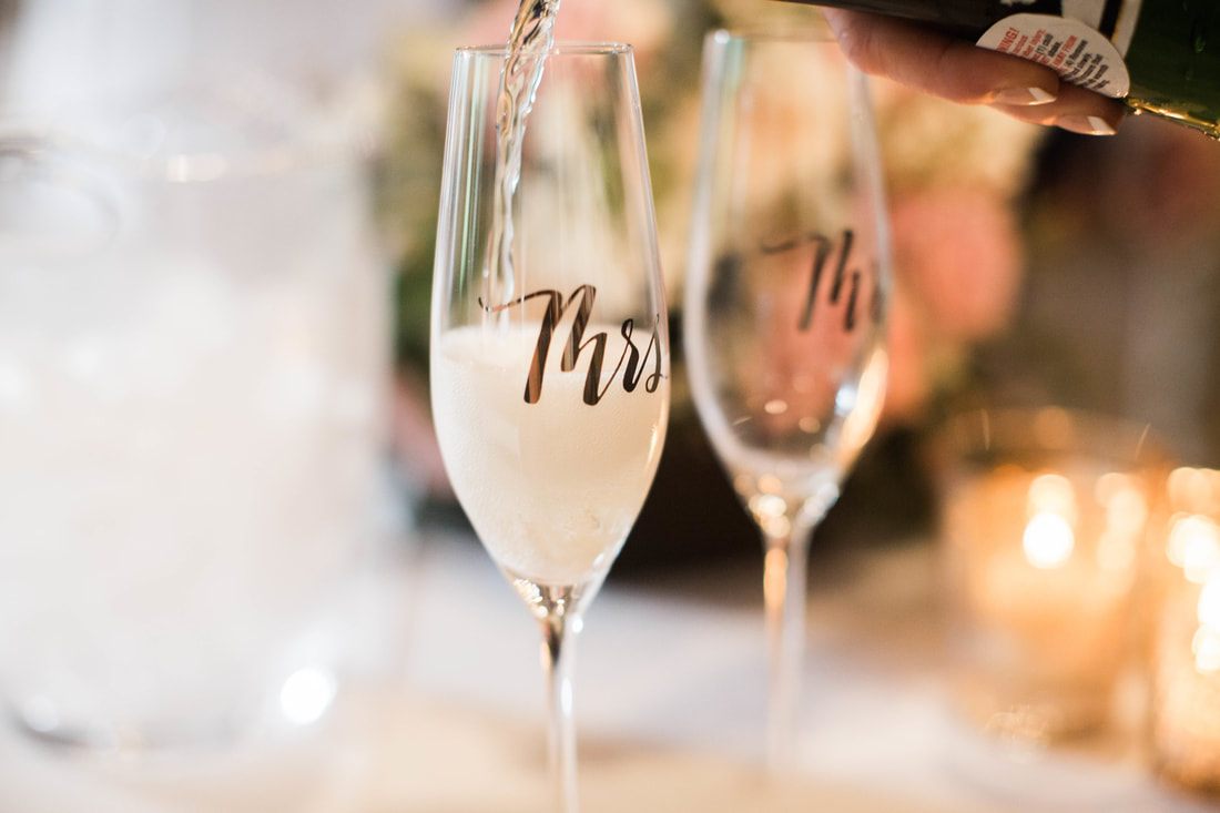 Bride's bouquet toss during the Charleston wedding reception