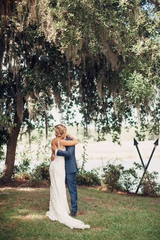 Final sunset portrait of Ashley and Madison at Magnolia Plantation