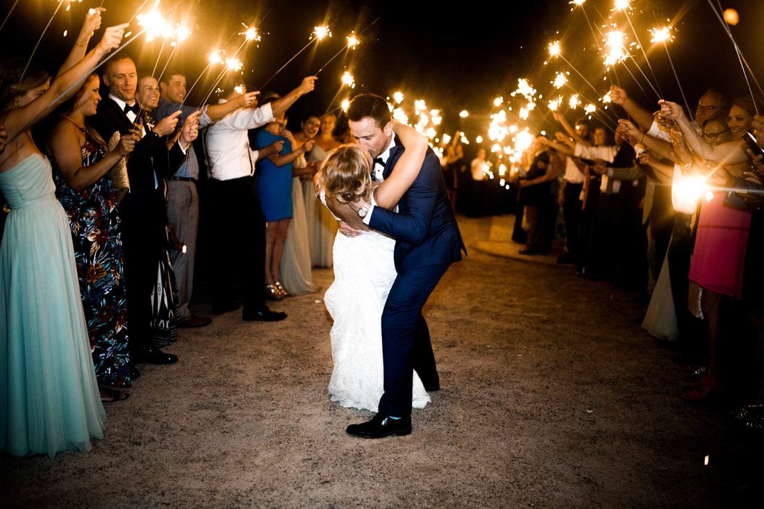 Bride's father walking her down the aisle at the Charleston ceremony