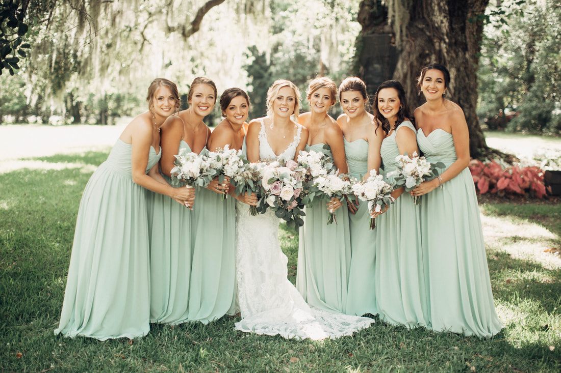 Reception toast captured mid-laugh from the maid of honor