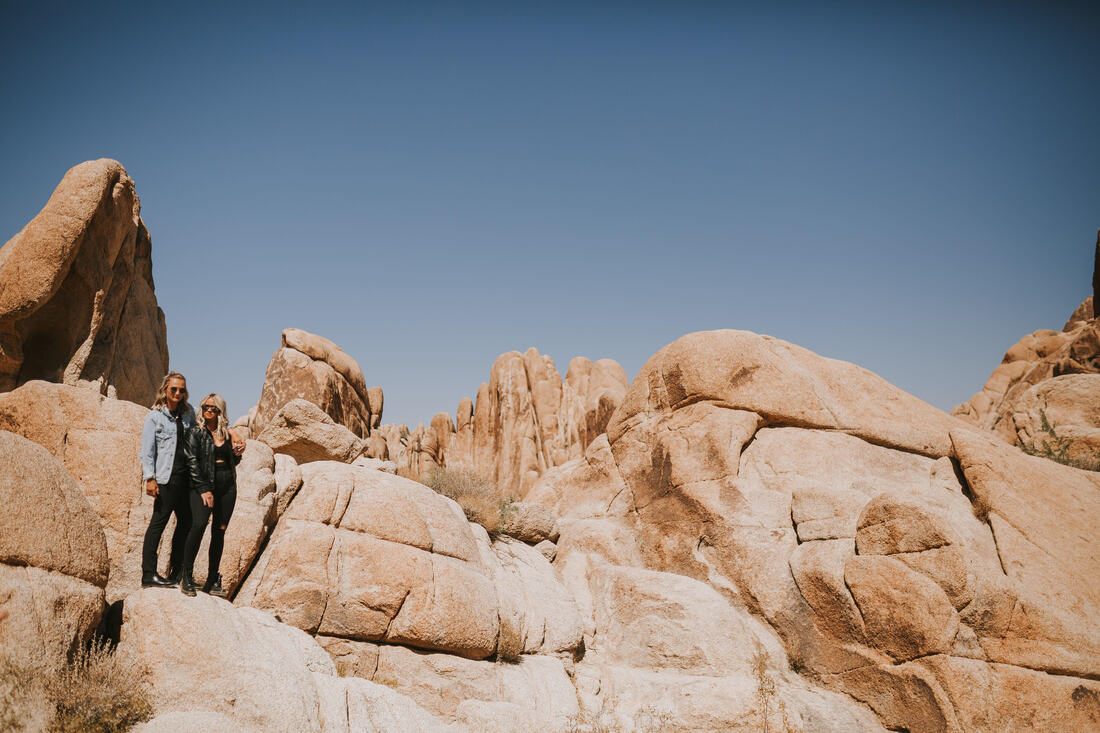 Ciarra and AJ share a laugh during a candid moment in Joshua Tree.