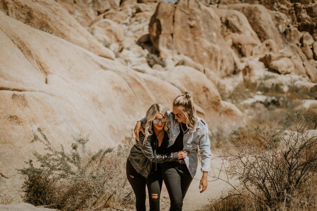 Ciarra and AJ share an embrace during their Joshua Tree post-nuptial photoshoot.