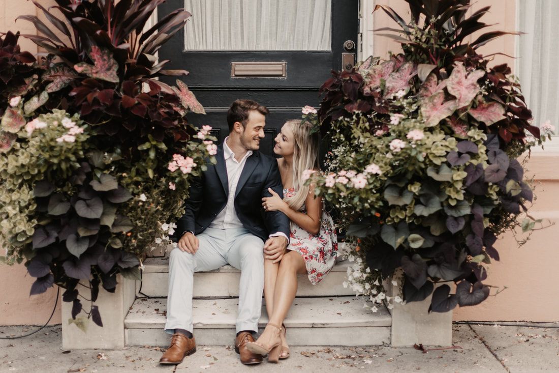 Engaged couple posing together during a Charleston engagement session