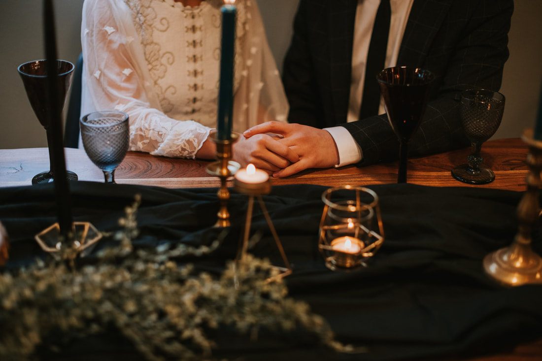 Couple embracing outside the PNW Cabin during their elopement