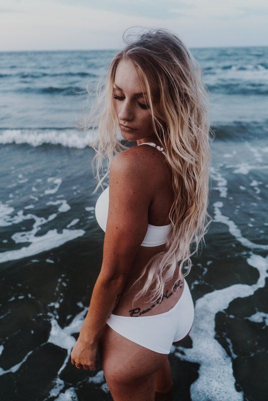 Folly Beach fashion shoot featuring a Free People denim look.