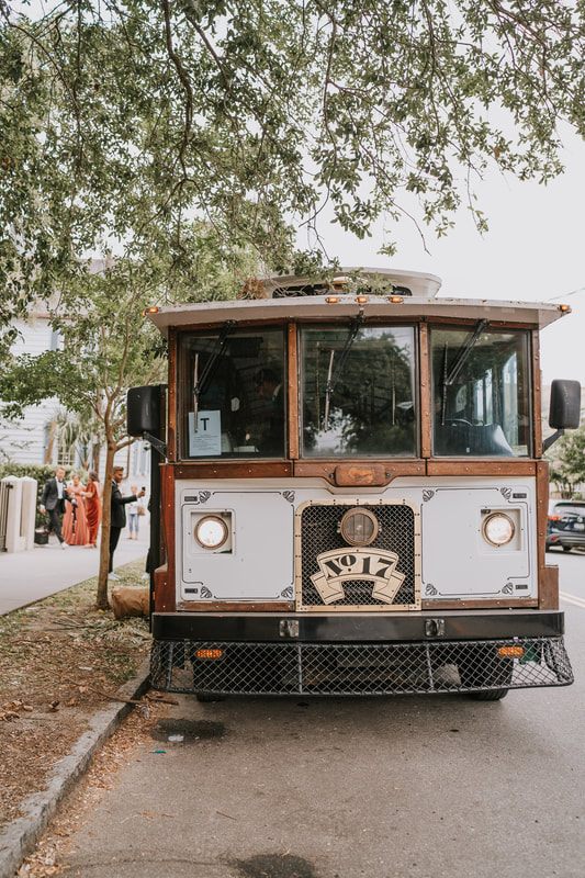 Candid moment between the newlyweds during their Charleston wedding reception