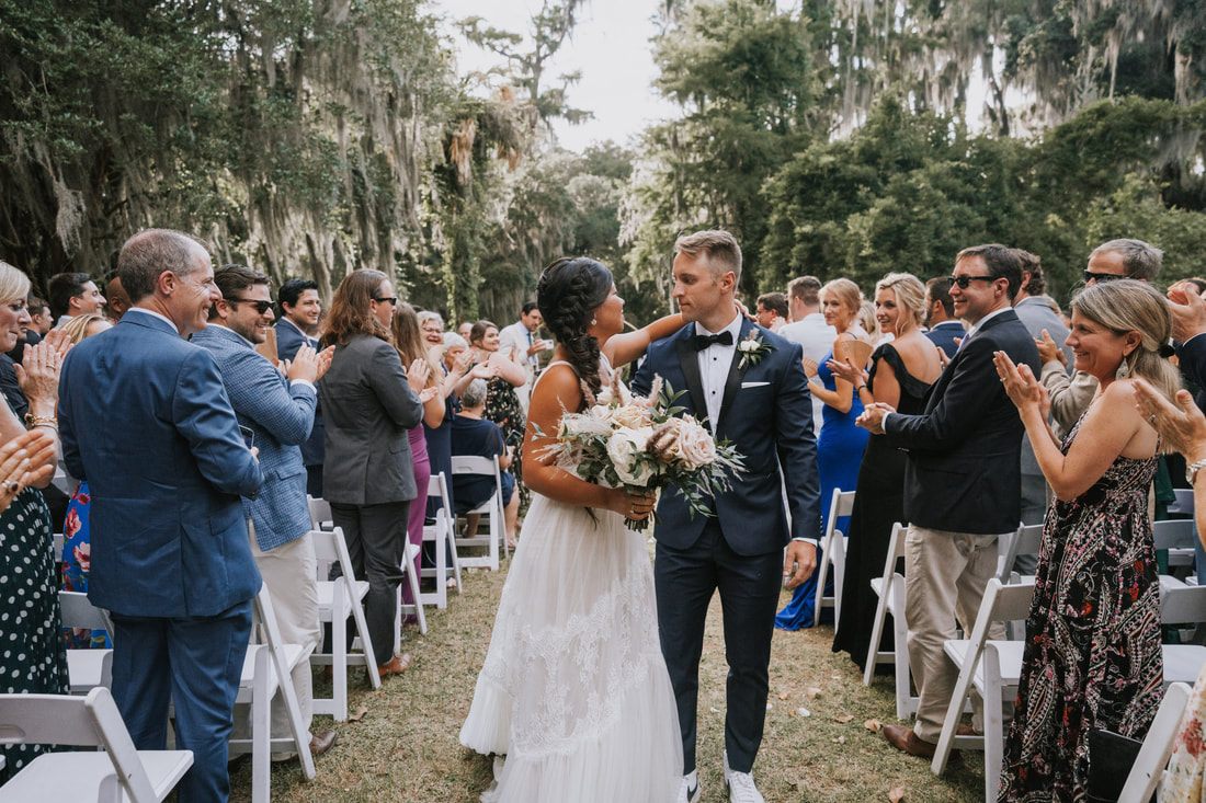 Wedding toast and celebration among friends at the Magnolia Plantation reception