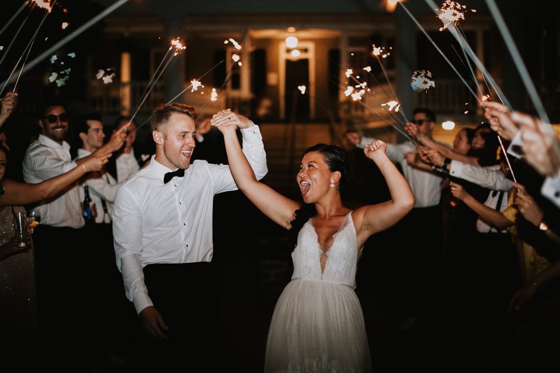 Guests cheering on the dance floor as the party gets going in Charleston