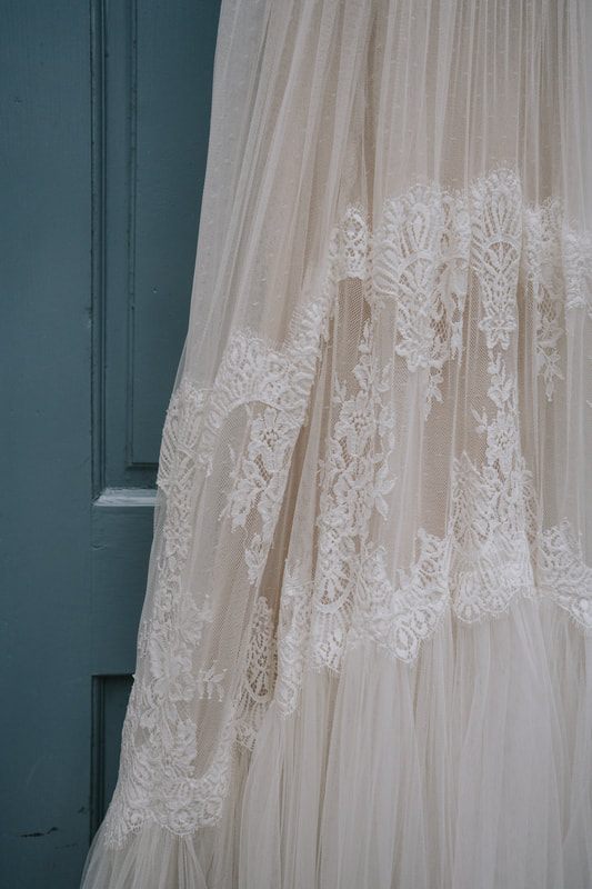 Guests dancing on the reception dance floor at this festival-inspired Charleston wedding