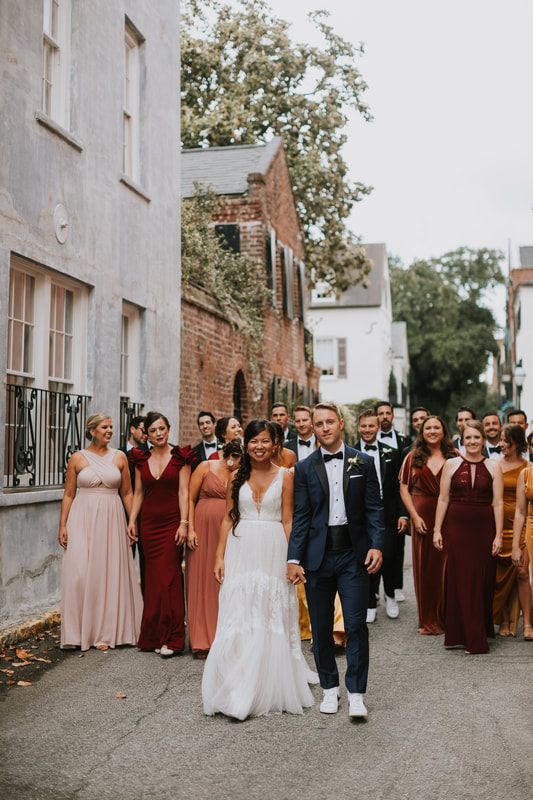 Bridesmaids laughing together before the Magnolia Plantation wedding ceremony