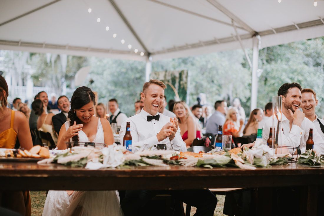 Wedding ceremony setup at Magnolia Plantation with Spanish moss overhead
