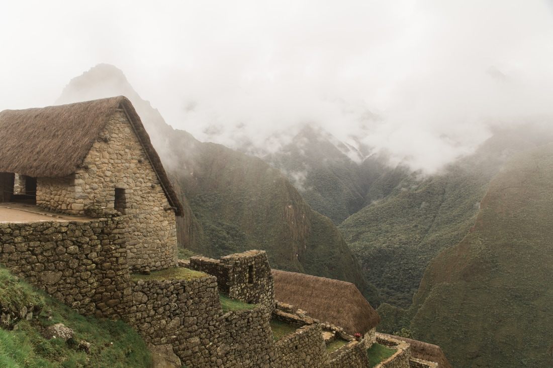 Close view of the citadel's stone terraces stepping down the mountainside