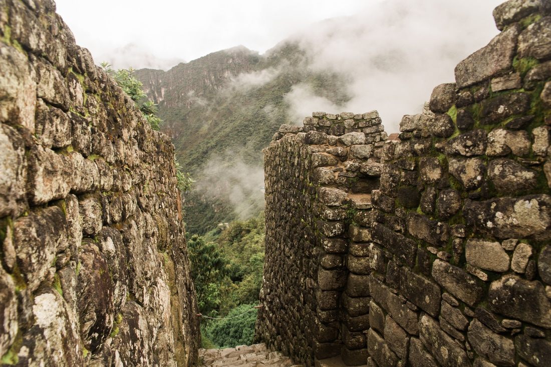 Golden light settling over the ancient citadel of Machu Picchu