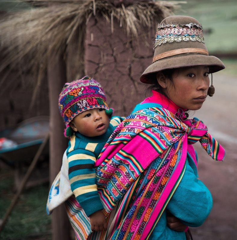 Hikers walking the trail toward Rainbow Mountain in the Cusco region of Peru