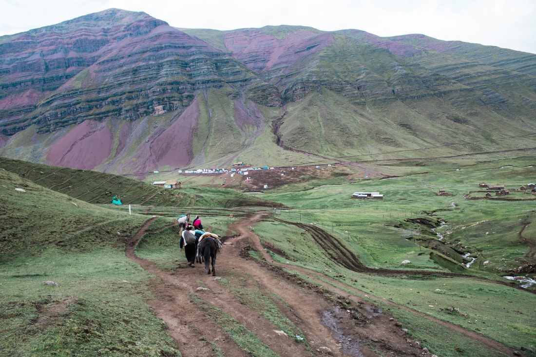 Colorful striped slopes of Rainbow Mountain (Vinicunca) in the Peruvian Andes