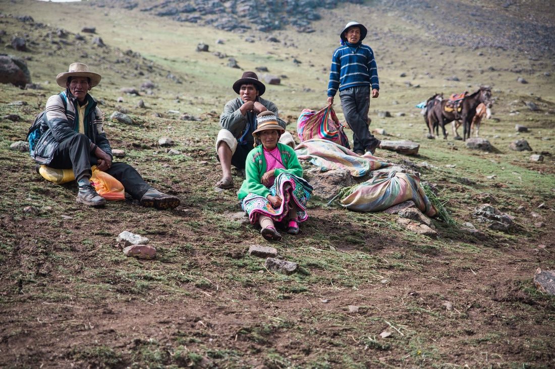 Andean village and grazing livestock along the trail to Vinicunca, Peru