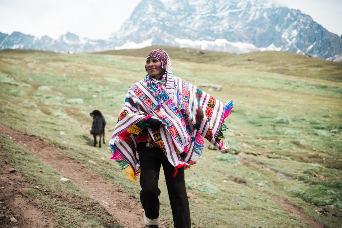 Hikers reaching the summit viewpoint of Rainbow Mountain, Peru