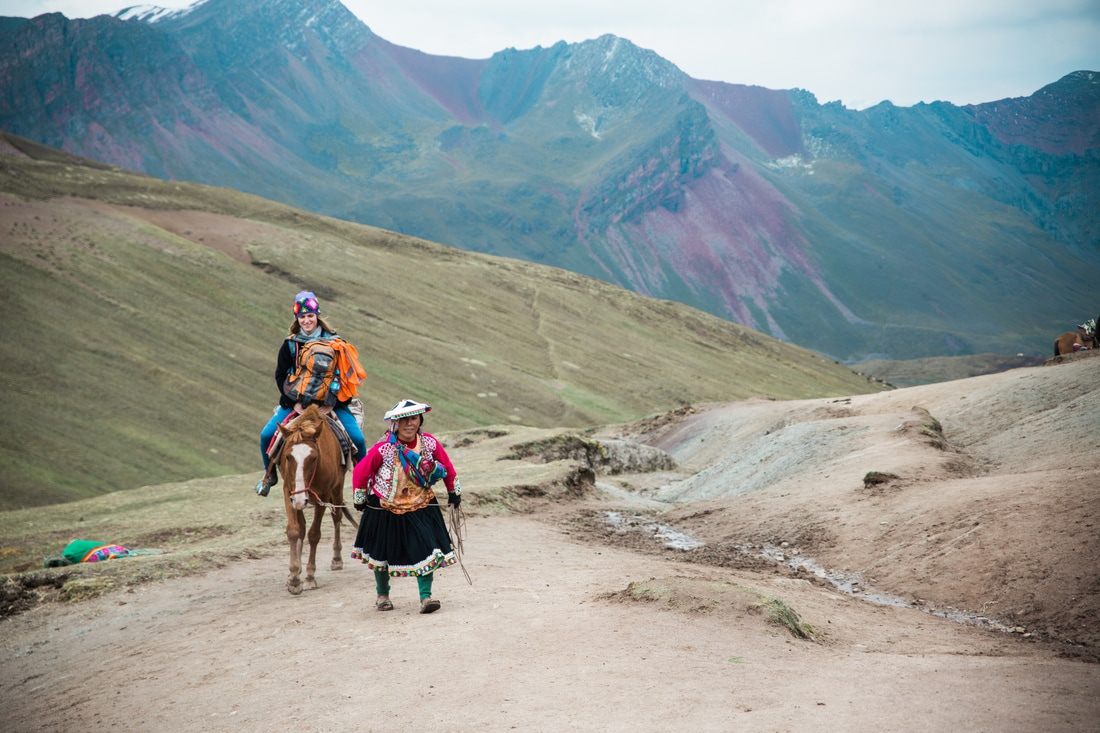 Clouds rolling over the Andes mountains near Vinicunca, Peru