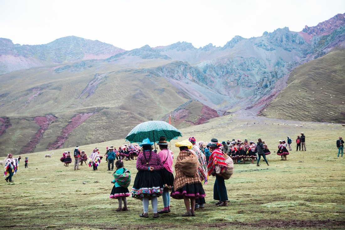 Andean village and grazing livestock along the trail to Vinicunca, Peru