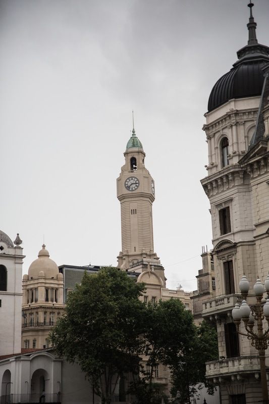 Photo of colorful colonial architecture along a city avenue in Buenos Aires, Argentina