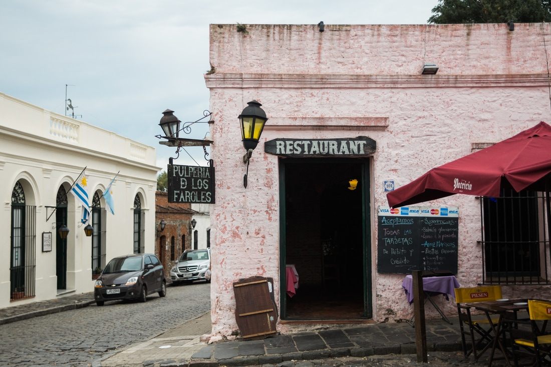 Cobblestone streets and old stone walls in Colonia's historic quarter