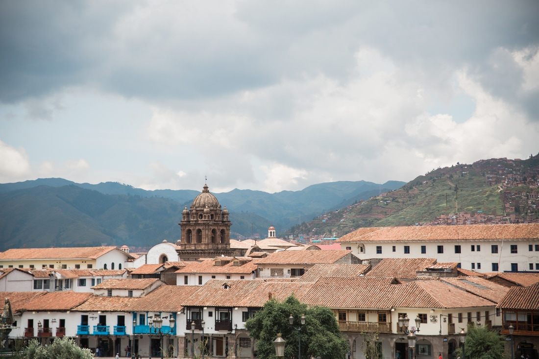 Photo of traditional Andean architecture along a city street in Cusco, Peru