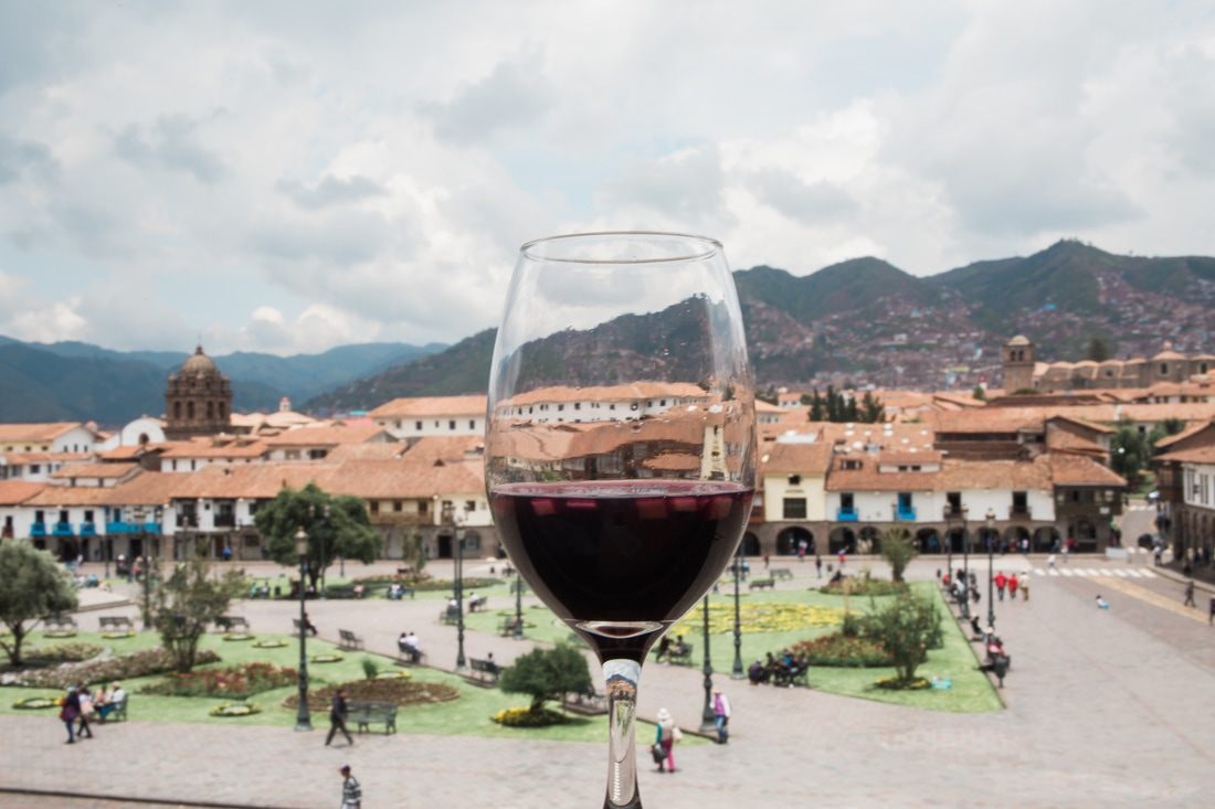 Photo of a misty mountain view above the city in Cusco, Peru
