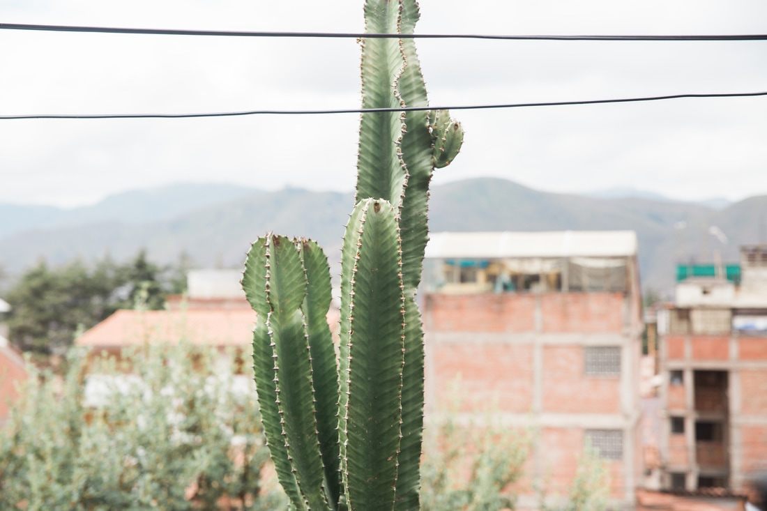 Photo of warm evening light over the rooftops in Cusco, Peru